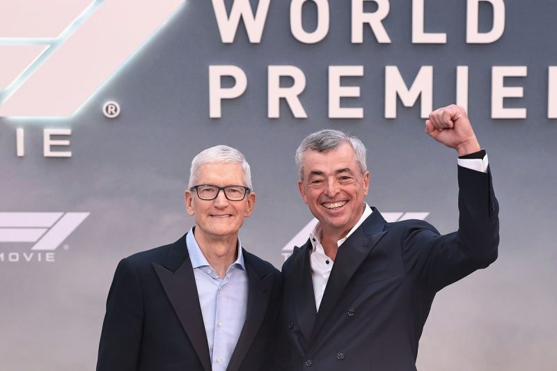 tim cook and eddy cue at the w
